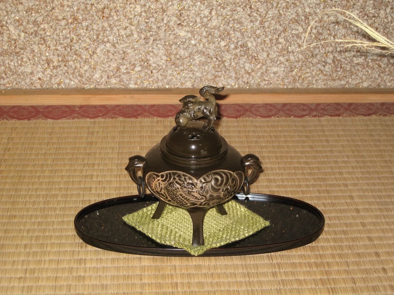 Japanese incense burner displayed on a tokonoma alcove.